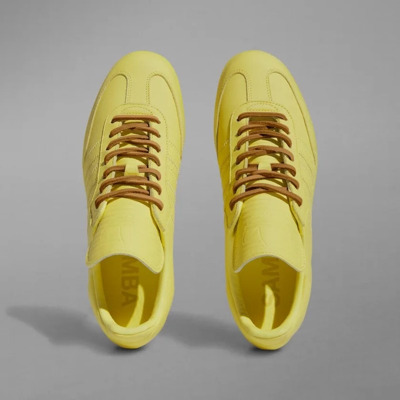 Human race yellow on sale sneakers